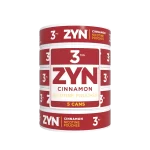 ZYN Cinnamon 3mg roll with 5 cans of sweet and spicy nicotine pouches.