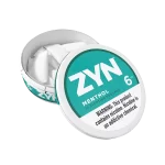 ZYN Menthol 6mg can with 15 nicotine pouches, featuring a fresh green design and discreet portion format.